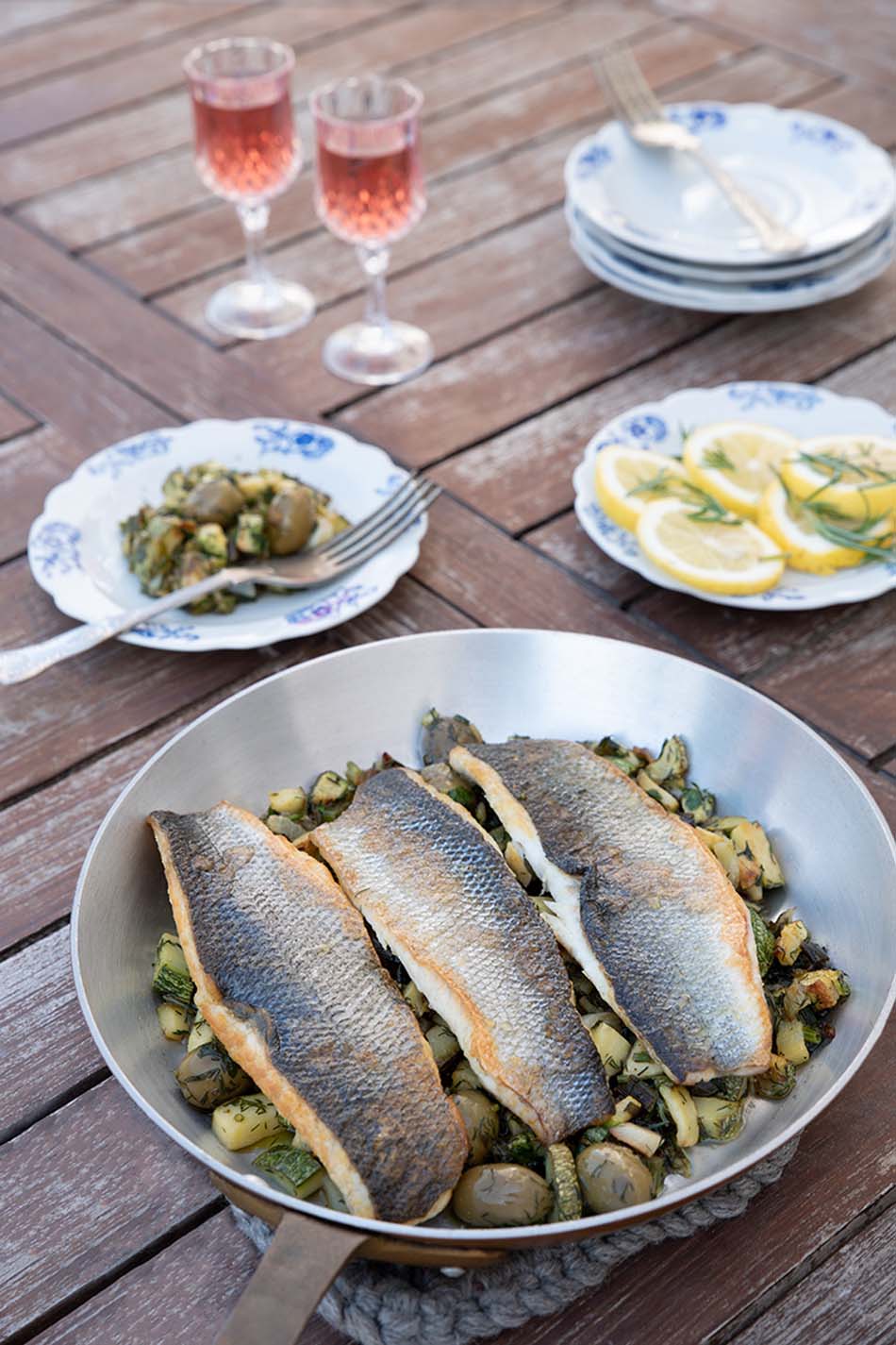 Sea - bass with zucchini and olives
