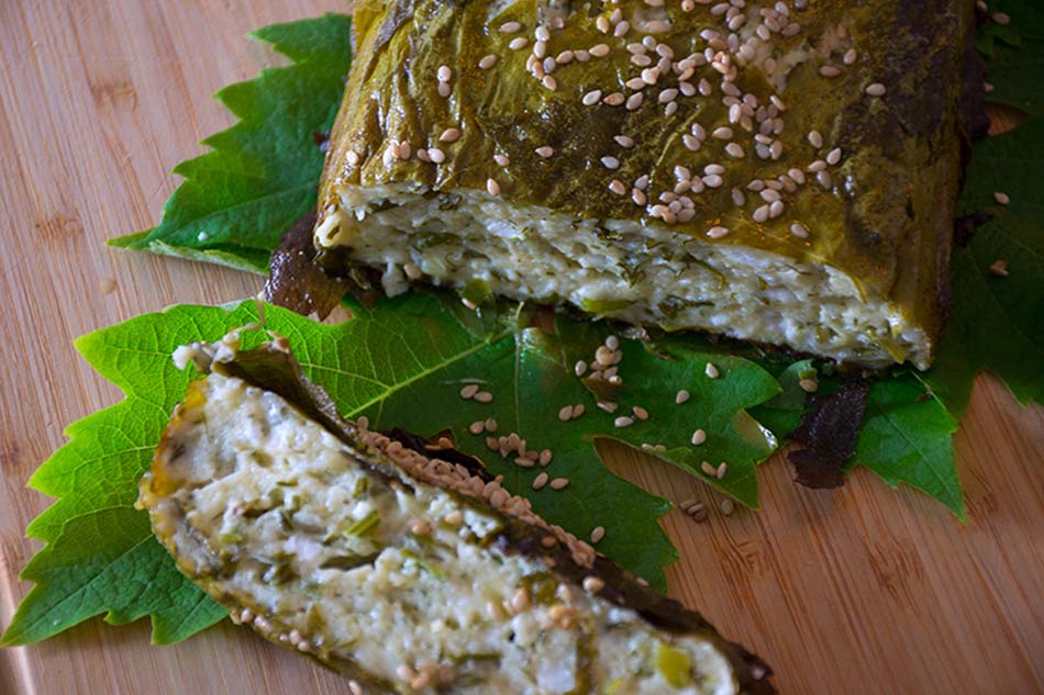 Cheese pie with grape leaves